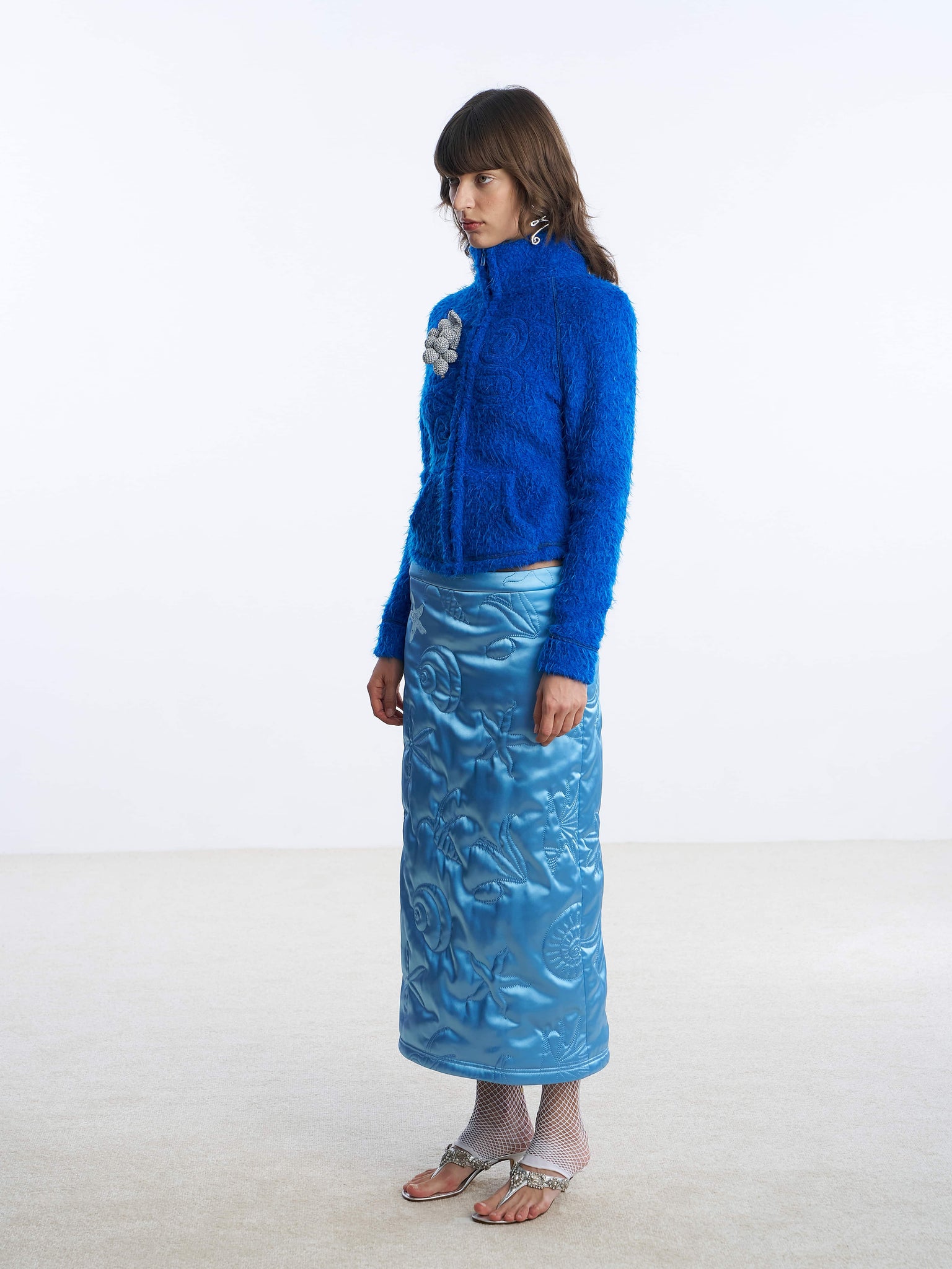 Blue shell puffer skirt detail