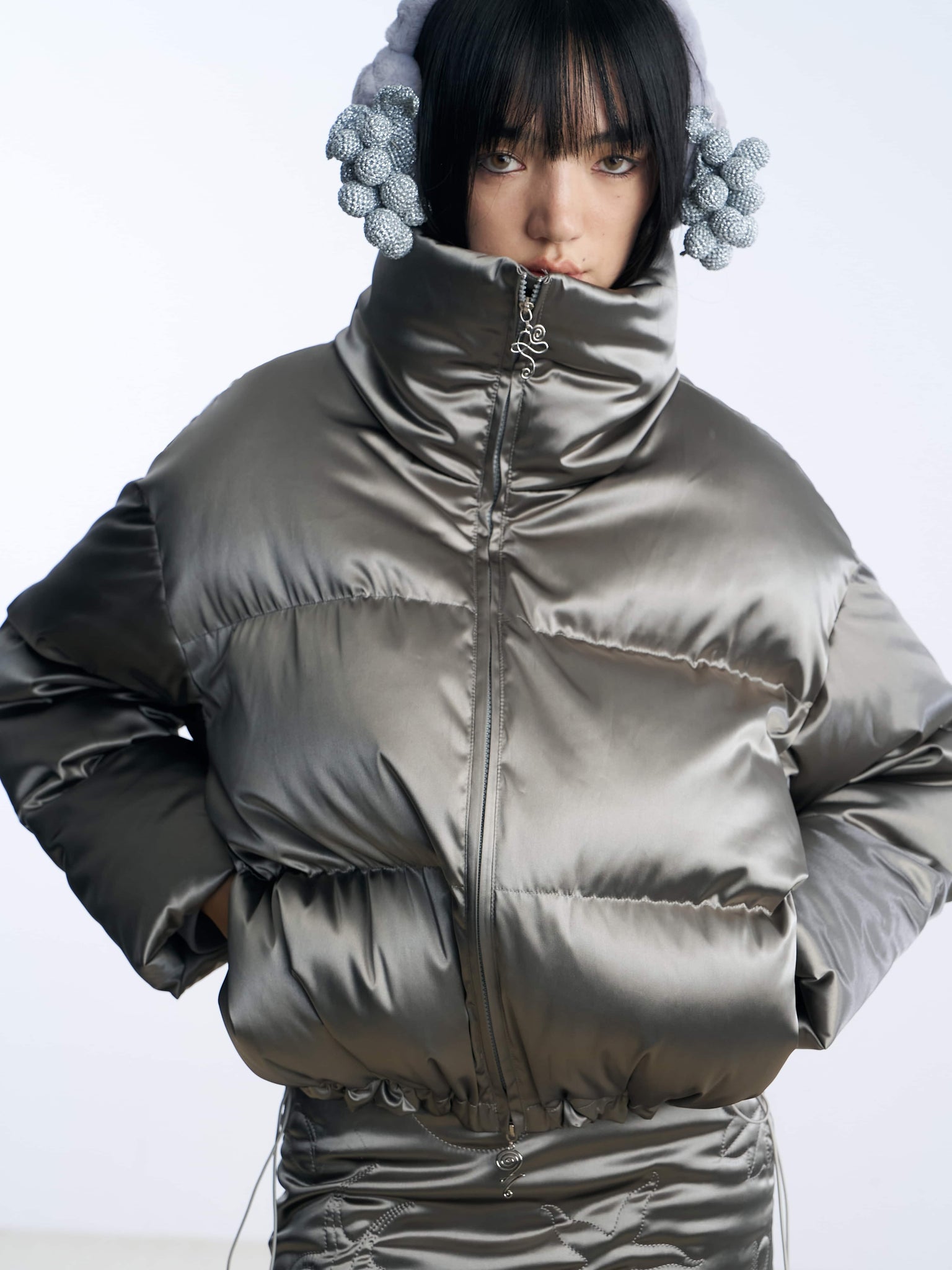 Gray oversize high-neck quilted down coat detail